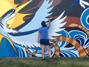 Christina Hollering painting mural