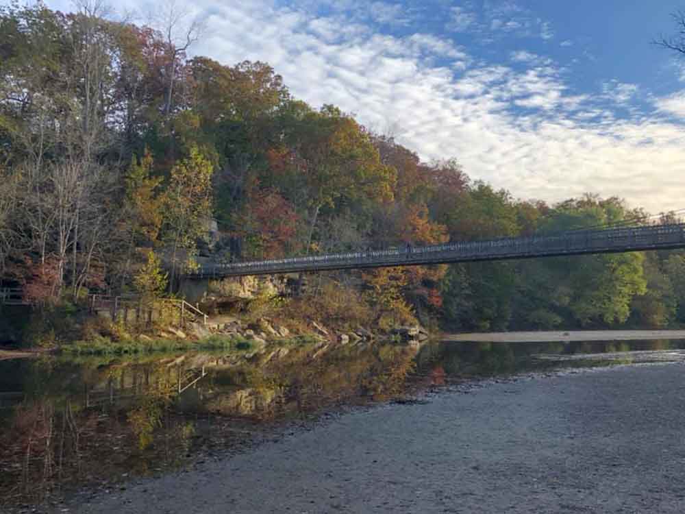 bridge crossing over creek to fall landscape